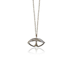 Silver eye-shaped pendant necklace on a white background