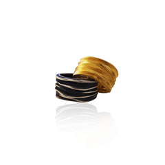 Athenais Flow Ring by Athenart in silver, gold plated, and oxidized finishes. Handmade adjustable Greek jewelry inspired by flowing folds.