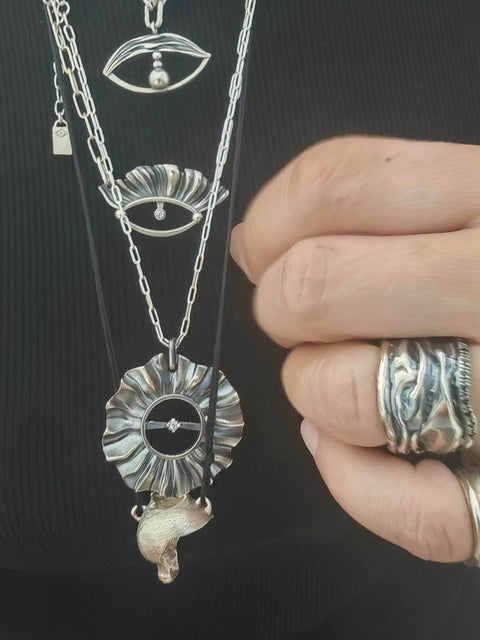 Helios , eyes and amphora pendant worn all together, layerd jewelry