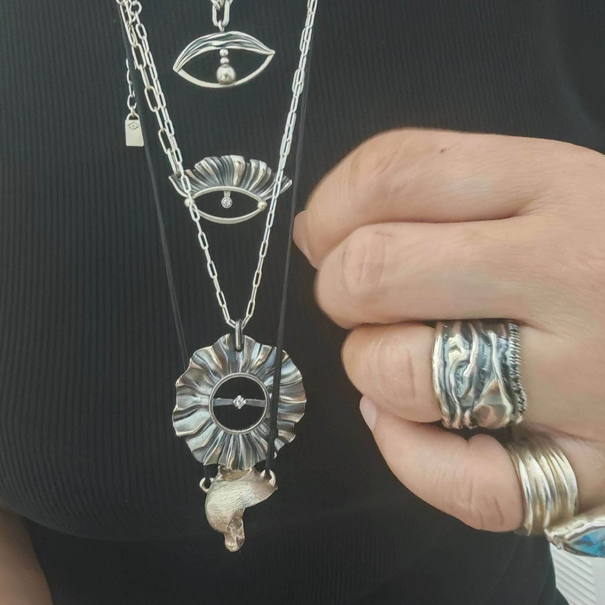 Helios , eyes and amphora pendant worn all together, layerd jewelry